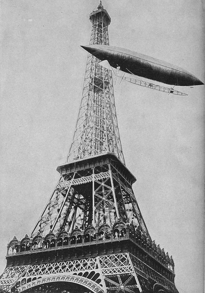 Dirigível ao redor da torre Eiffel